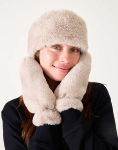 Oatmeal cream faux fur hat and mittens set.