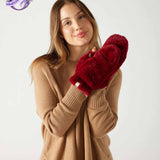 woman wearing mersea cozy cabin faux fur mittens in wine color