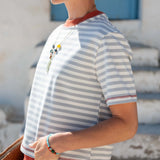 Slate blue and persimmon striped ringer tee with a contrast collar and trim.