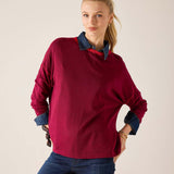 Sangria knit sweater with a layered buttoned collar and long sleeves.