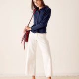 MERSEA women's travel-friendly women's travel-friendly navy ribbed oxford button-down shirt with a full-length sleeve and front pocket.