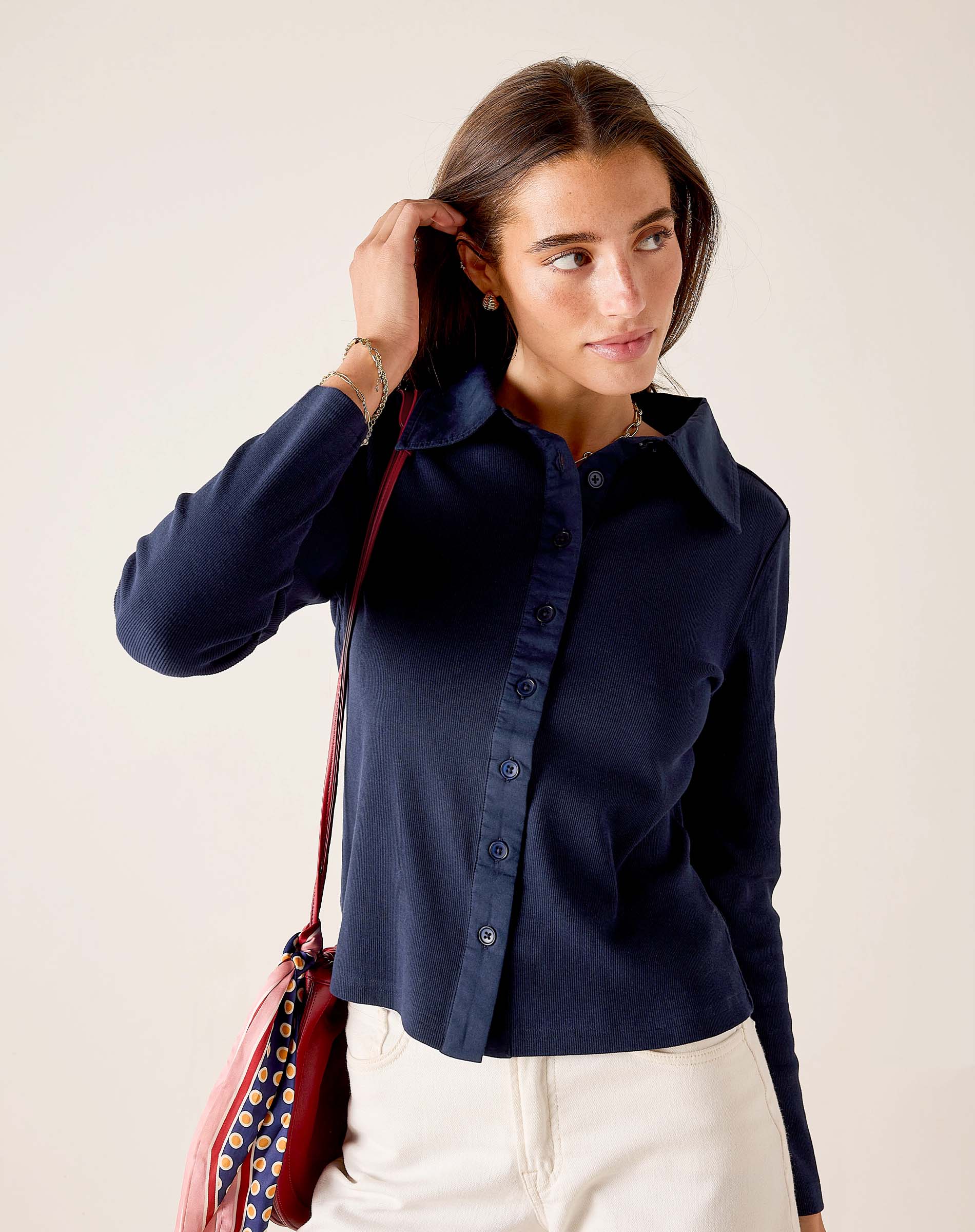 Navy ribbed Oxford button-down shirt with long sleeves and a pointed collar.
