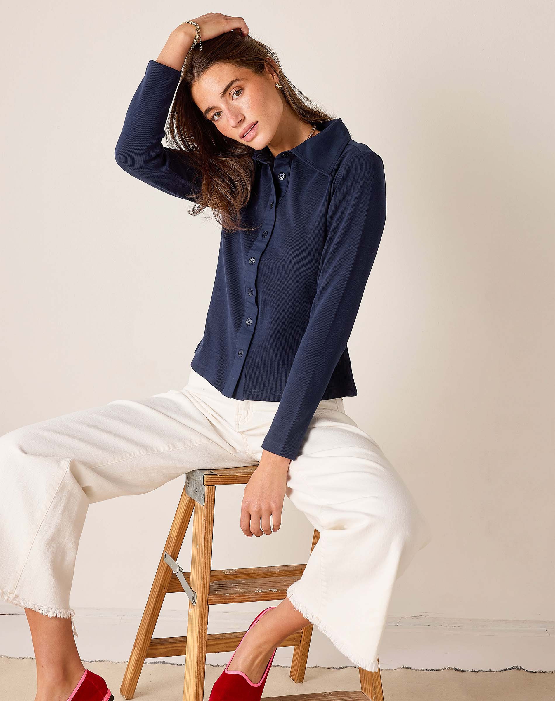 Navy ribbed oxford button-down shirt with long sleeves and a collar.