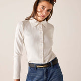 White ribbed Oxford button-down shirt with a pointed collar and front buttons.