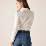 Side view of the white ribbed oxford button-down shirt.