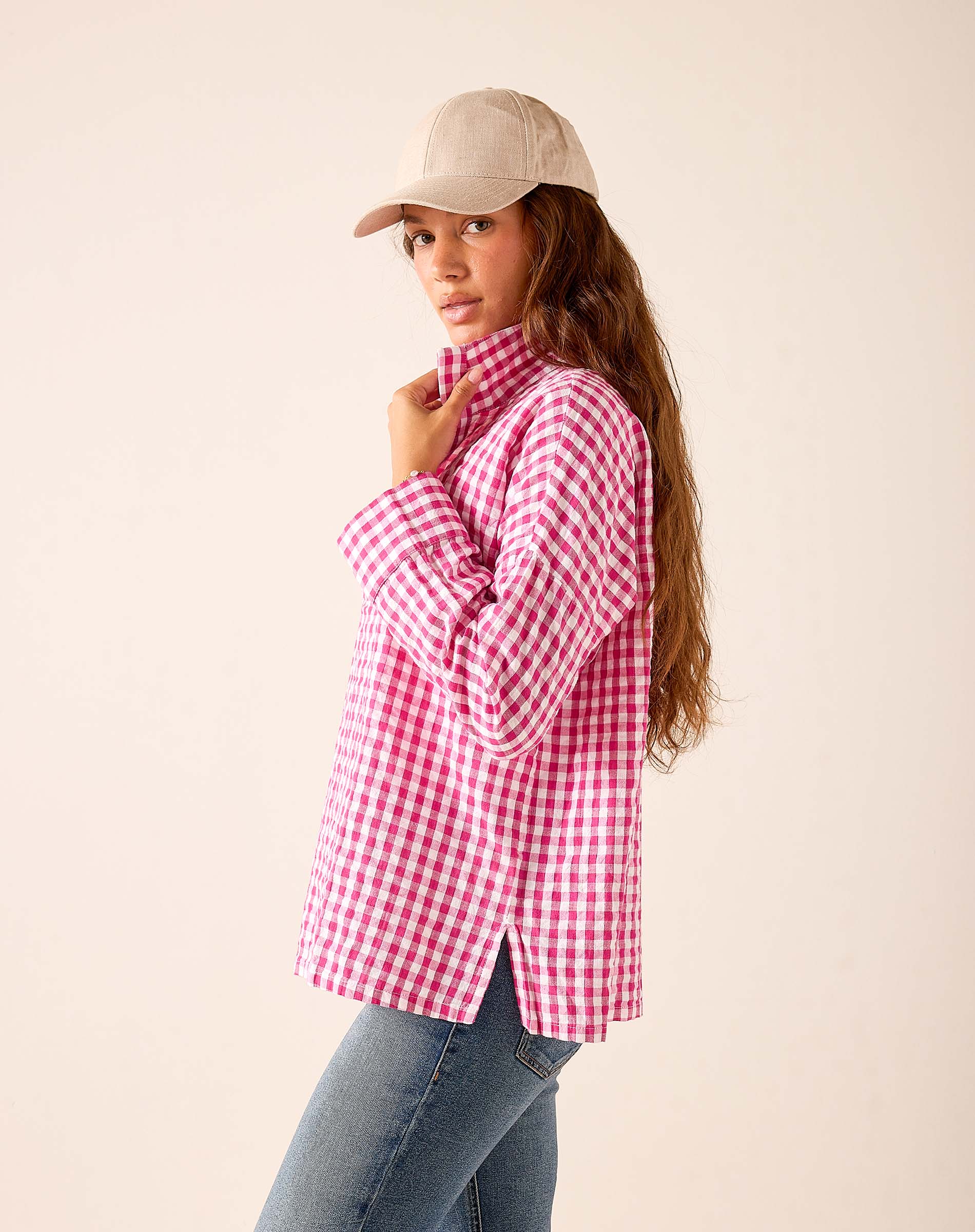 Dark pink gingham button-down shirt with a relaxed fit and long sleeves.