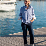 Blue and white double-striped Elizabethan collar top with buttoned cuffs and rolled sleeves.