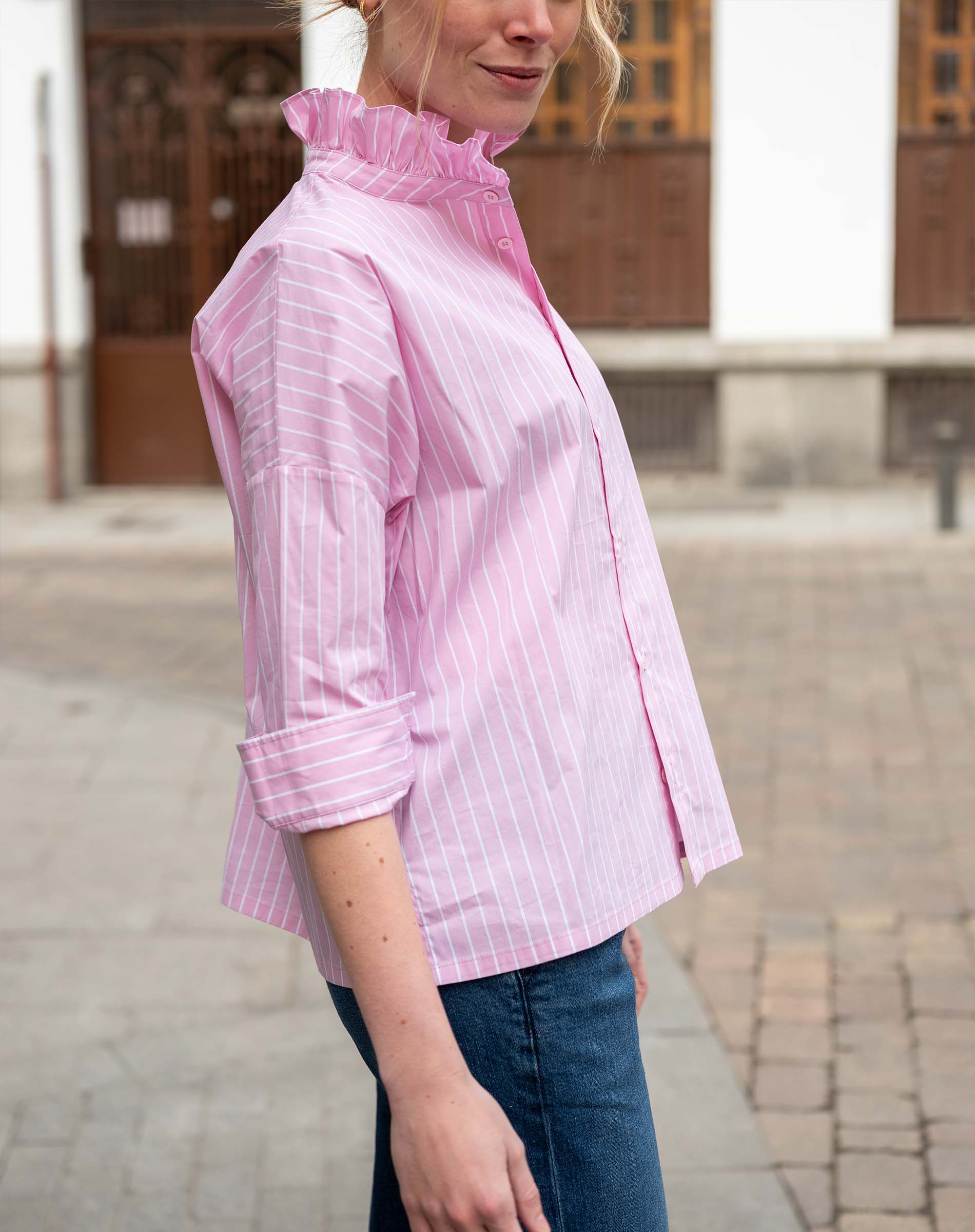 Rose pinstripe shirt with an Elizabethan collar and long sleeves