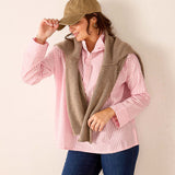 Ladies' travel-ready light pink gingham button-down shirt featuring a relaxed fit and soft cotton blend fabric.