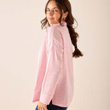 Light pink gingham button-down shirt with a relaxed fit and lightweight texture.