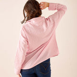 Light pink gingham button-down shirt with a relaxed fit and long sleeves.