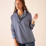 Women's travel-friendly navy gingham button-front pullover with a collar and half-zip neckline.