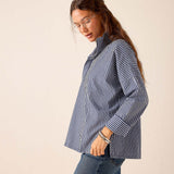 Navy gingham cotton button-up shirt with long sleeves and a collar.