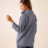 Side view of women's travel-friendly navy gingham button-down shirt.