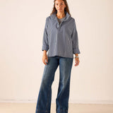 Navy gingham oversized tunic top with a buttoned front and 3/4 sleeves.