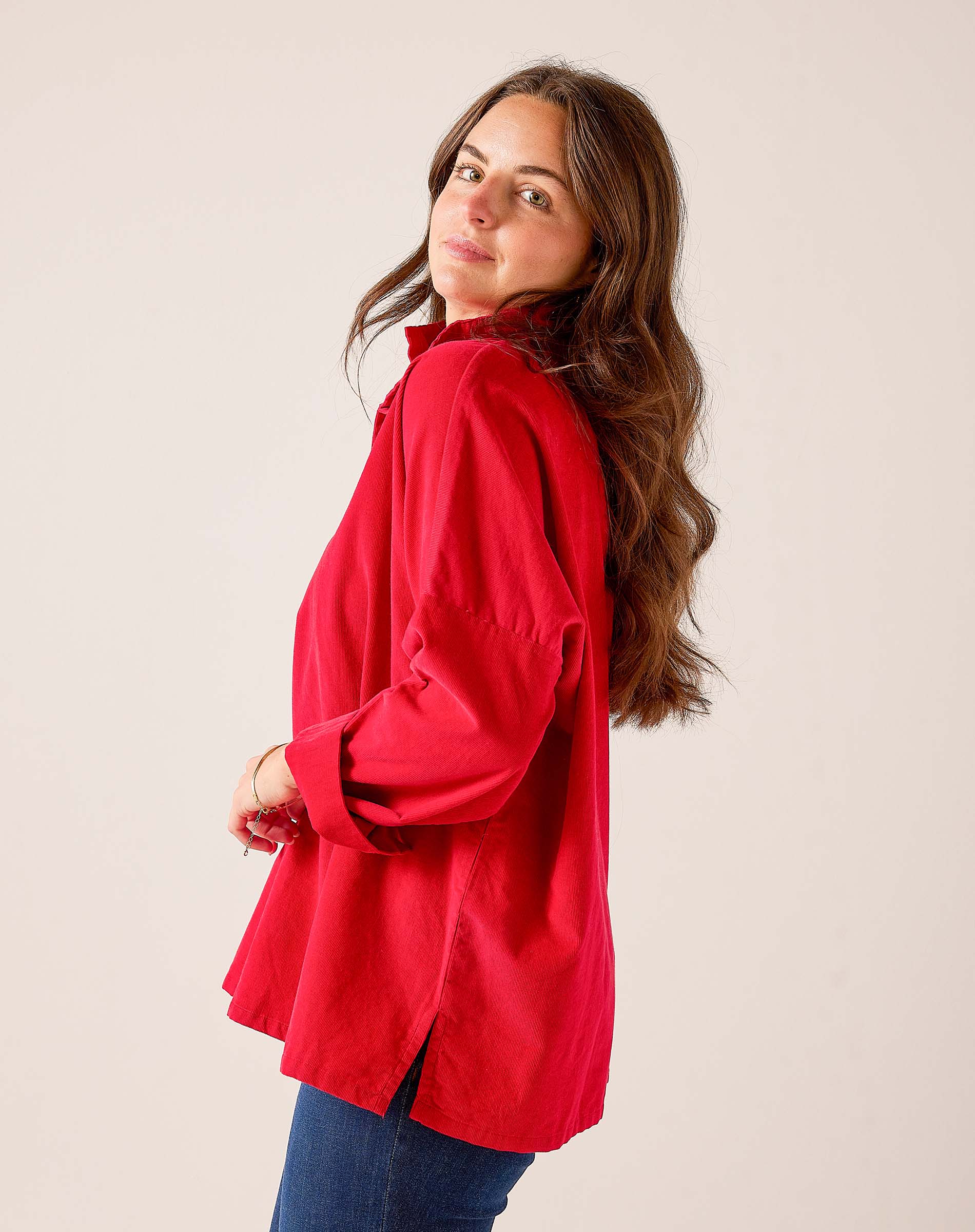 Cardinal red oversized linen-blend tunic top with buttoned cuffs and relaxed fit.