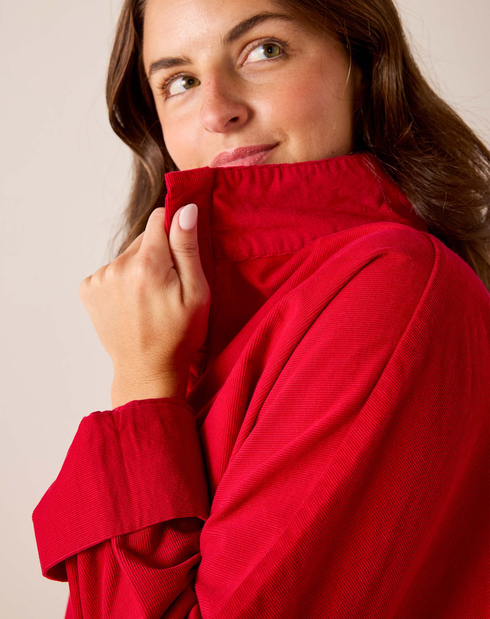 Cardinal red high-neck knit top with ribbed detail