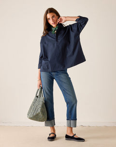 MERSEA ladies' travel-ready navy blue oversized tunic-style top with a rounded neckline and wide sleeves.