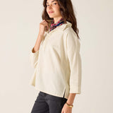 Opal white relaxed-fit linen-blend tunic top with a buttoned placket and side slits.