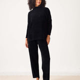 Women's travel-friendly black chenille knit pants with wide legs and a relaxed fit.