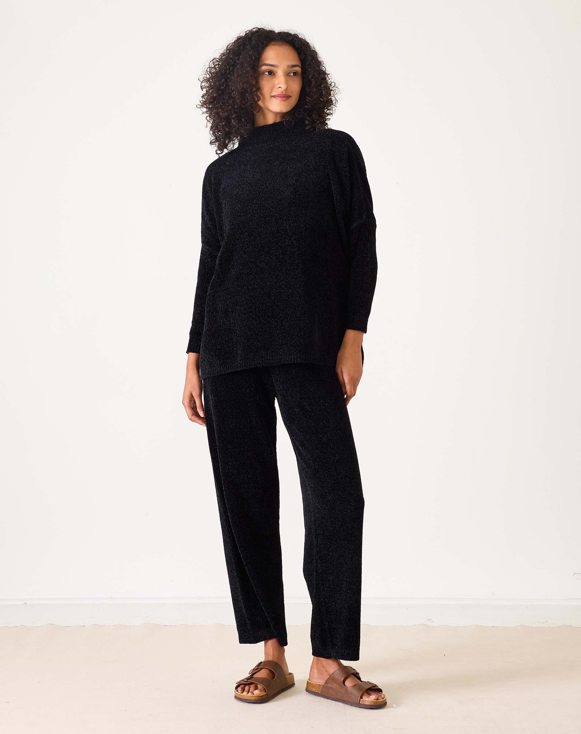 Women's travel-friendly black chenille knit pants with wide legs and a relaxed fit.