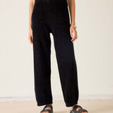 MERSEA ladies' travel-ready black chenille oversized wide-leg pants.