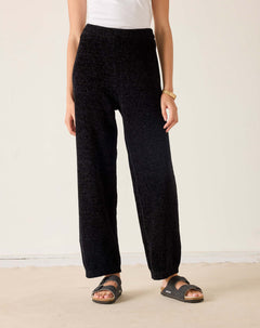 MERSEA ladies' travel-ready black chenille oversized wide-leg pants.