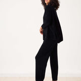 Black chenille textured pant featuring a relaxed fit and wide leg.