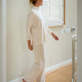 Women's travel-friendly cream chenille pants with a relaxed fit and soft texture.