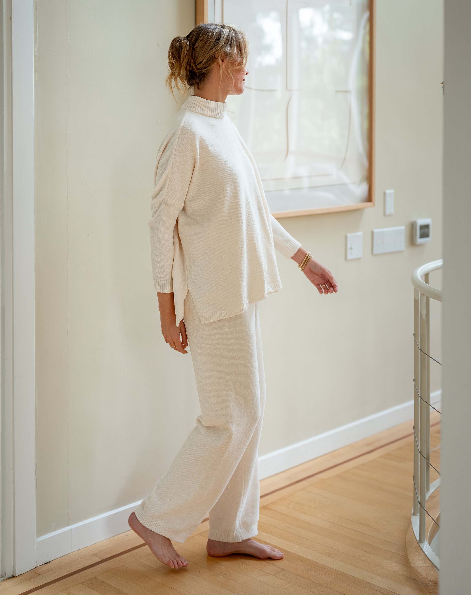 Women's travel-friendly cream chenille pants with a relaxed fit and soft texture.