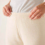 Cream chenille knit pants with a wide ribbed waistband.