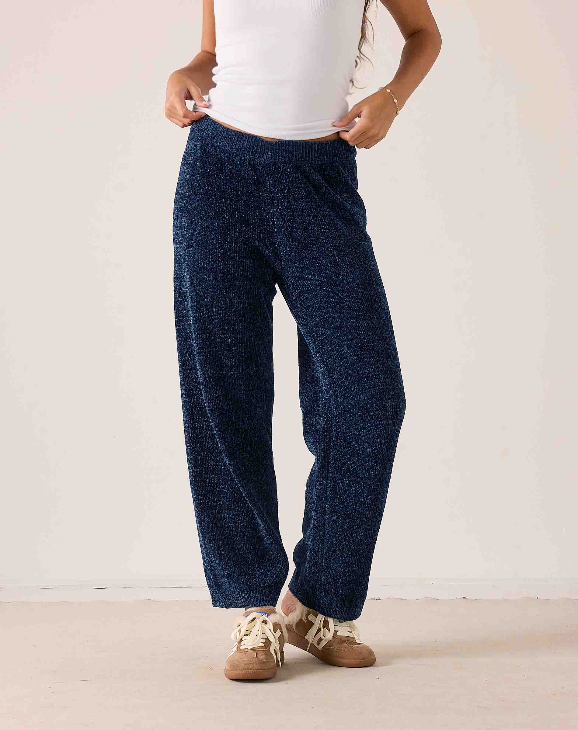 Navy blue chenille knit pants with a wide leg and relaxed fit.