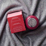 MERSEA women's travel-friendly mERSEA's travel-friendly electric burgundy fabric shaver and its red box showing 'FABRIC SHAVER' and 'SHAVE ANTI-BOLLOCHES'.