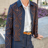 Navy blue embroidered motif jacket in rinse color.