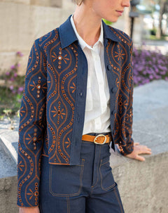 Navy blue embroidered motif jacket in rinse color.
