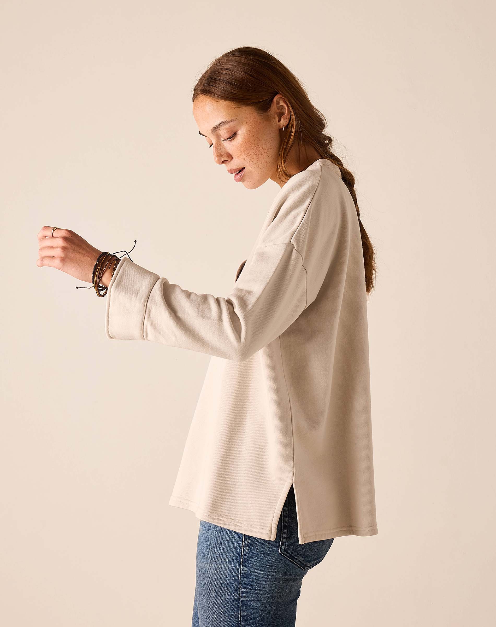 MERSEA women's travel-friendly bone knit top with wide cuffs and a relaxed fit.