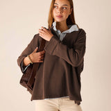 MERSEA ladies' travel-ready espresso brown knit top with wide ribbed cuffs and a layered white shirt collar.