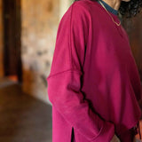 Winterberry crewneck knit sweater featuring a relaxed fit and soft wool blend.