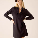 Black knit cotton blend Frenchie dress with a V-neckline and front flap pockets.