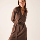 Ladies' travel-ready espresso brown relaxed-fit jersey dress with a waist tie and front pockets.