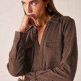 Espresso brown button-down shirt with a collar and chest pockets.