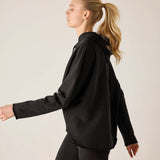 Black hoodie with a relaxed fit and drawstring hood.