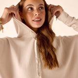 MERSEA women's travel-friendly bone hoodie with a drawstring and front pocket.