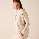 Bone hoodie with drawstring hood and matching pants.