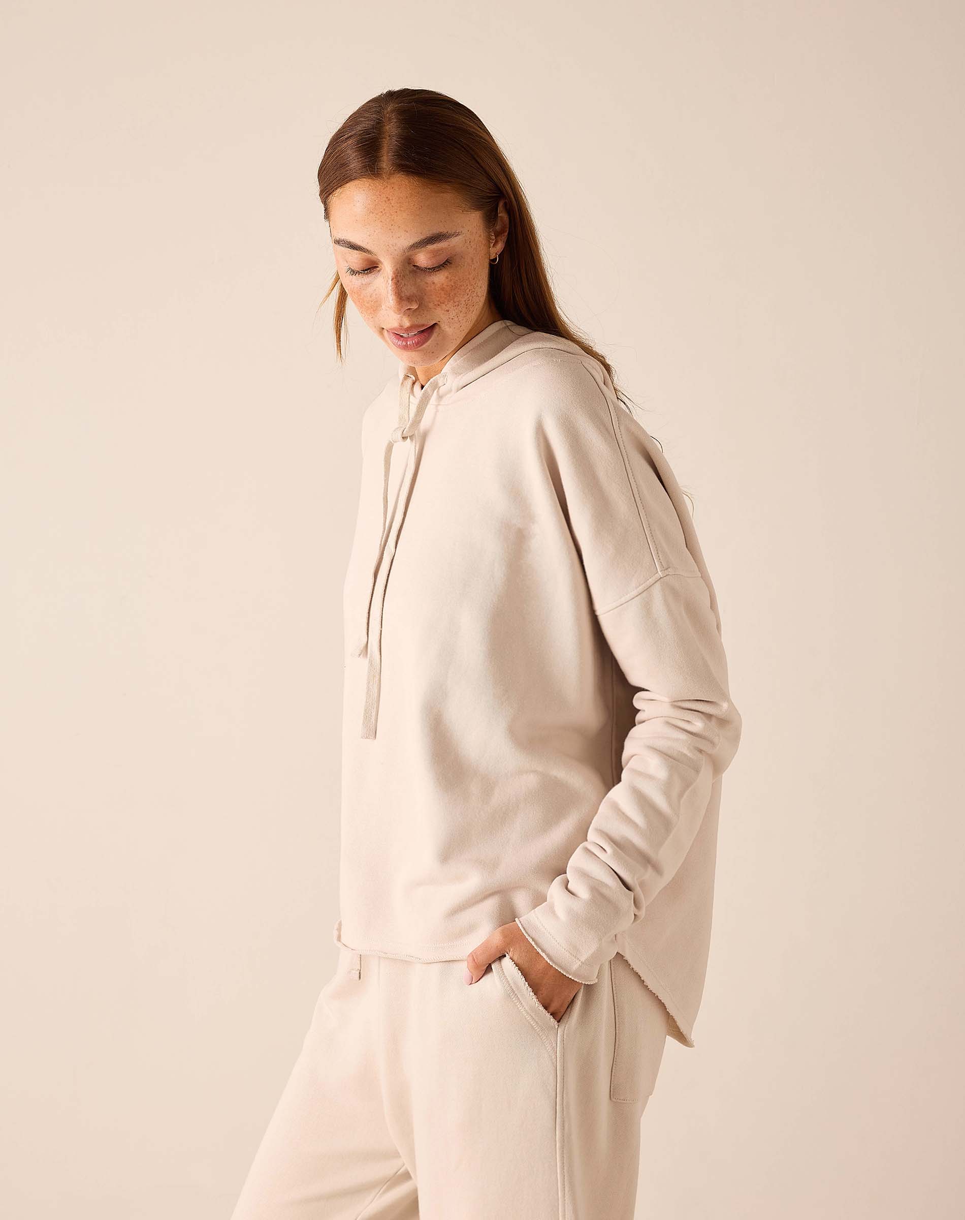 Bone hoodie with drawstring hood and matching pants.