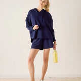 MERSEA women's travel-friendly cadet blue hoodie and matching shorts set.