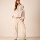 Bone hoodie and matching jogger set in a soft knit fabric.