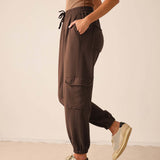 Espresso brown Frenchie joggers with elastic waist and cargo pockets.