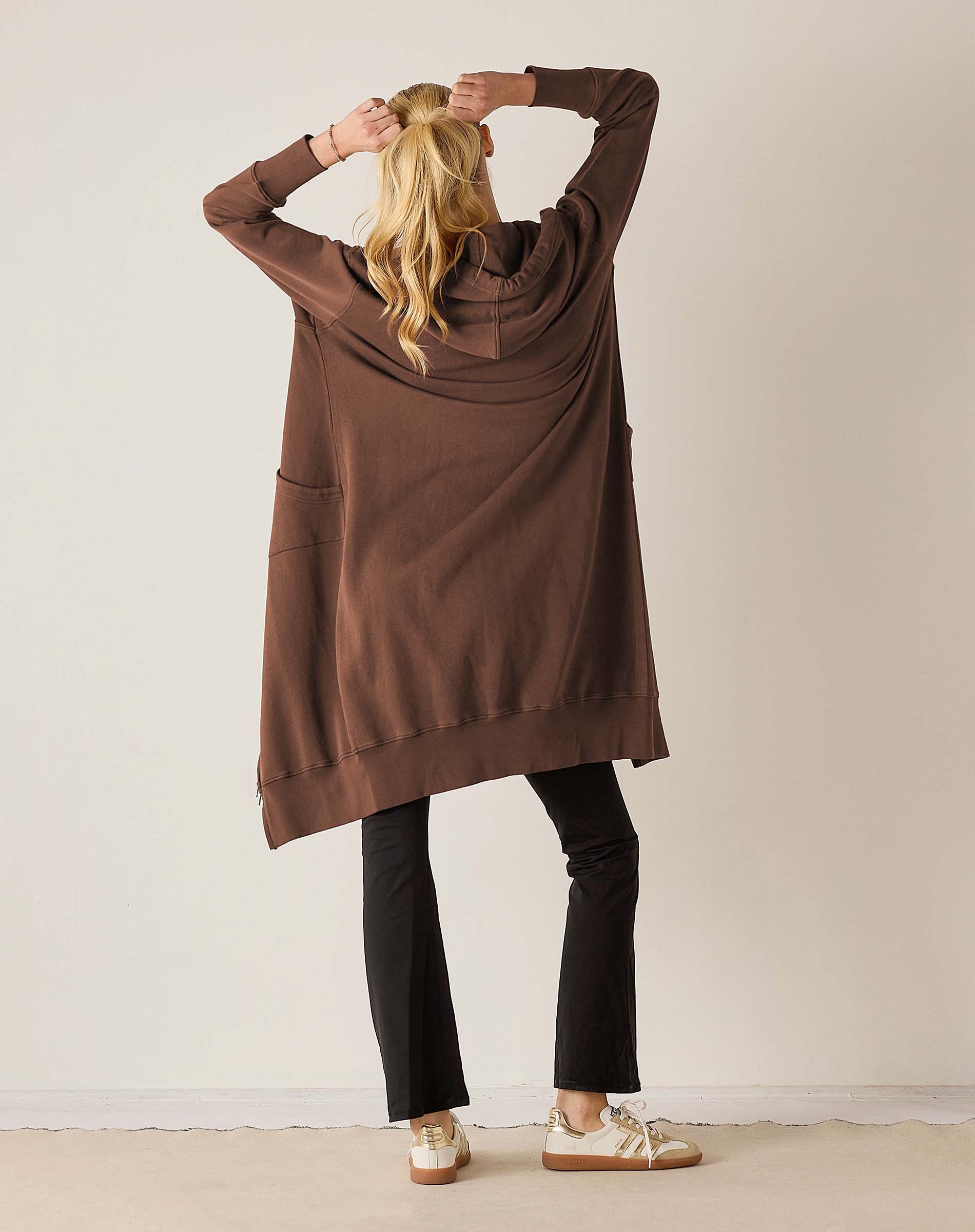 Back view of the espresso brown oversized hoodie with a hood and long sleeves.