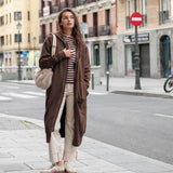 Espresso brown maxi hoodie with a front zipper and cozy knit texture.